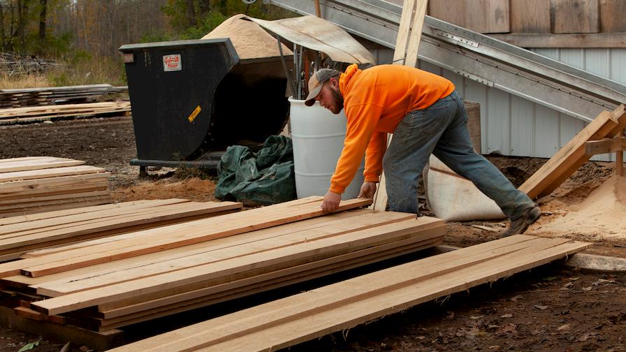 Luke stacking cut boards 