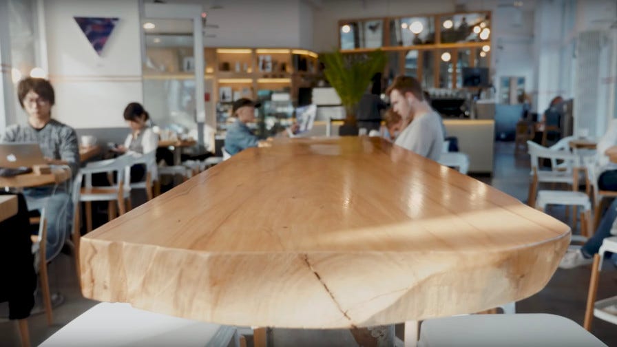 Custom wood table in coffee shop